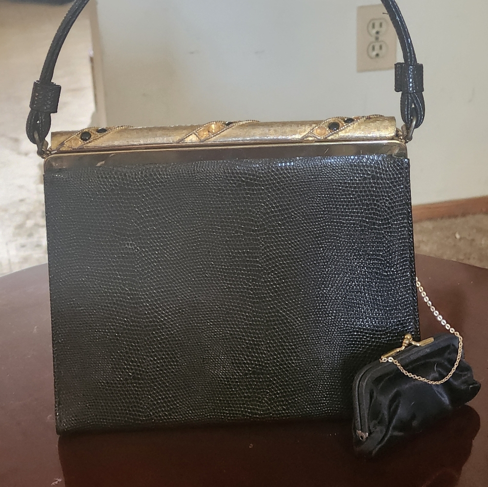 Elegant Black Handbag with Gold Accents